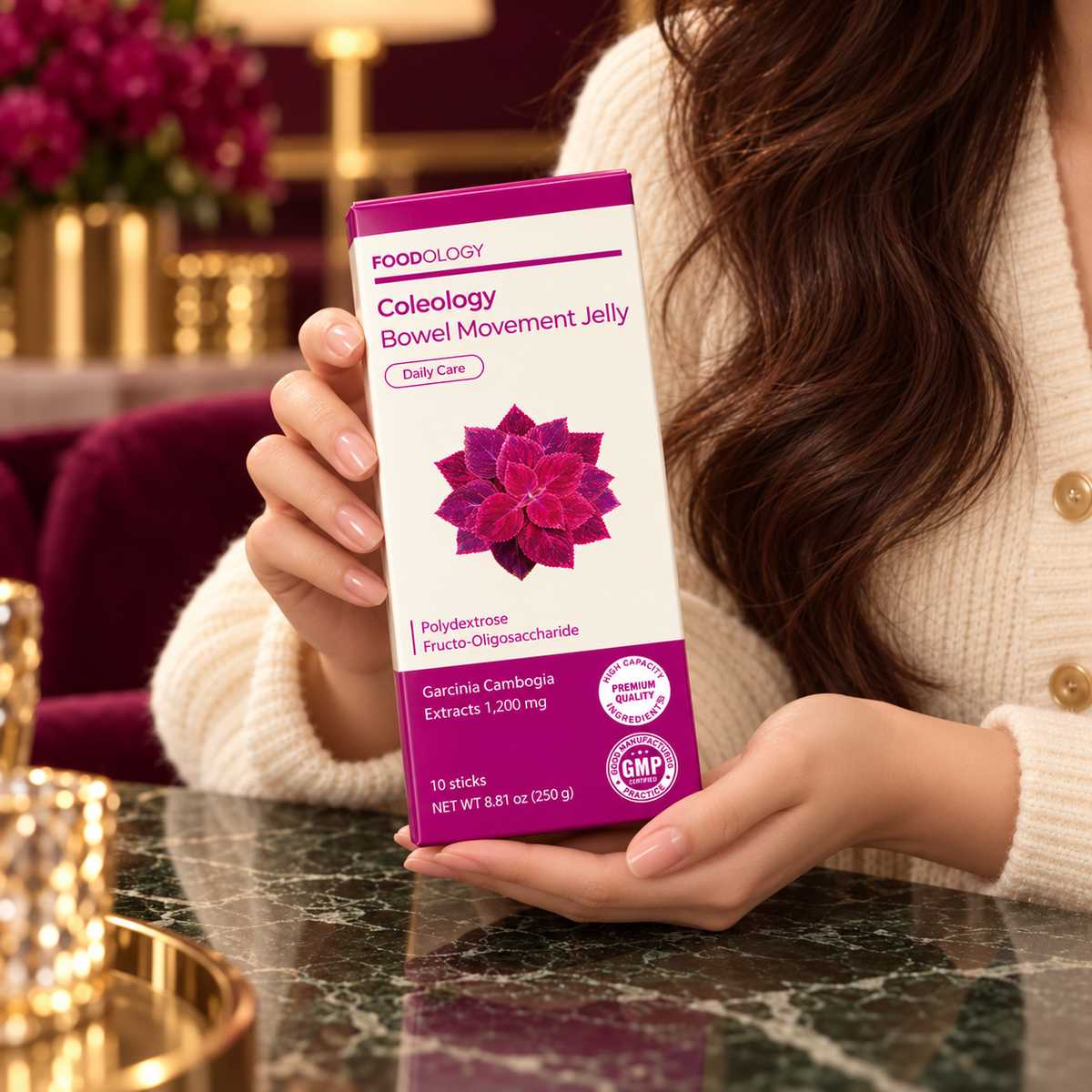 FOODOLOGY Coleology Bowel Movement Jelly closed 10-stick carton — front-label detail in hands; AI-styled product presentation.