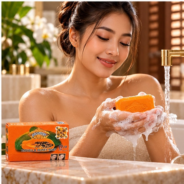 ASANTEE Papaya & Honey Herb Soap — 125 g — adult using the product