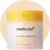 White jar of toner pads with turmeric and kojic acid clarifying soothing formula for troubled skin