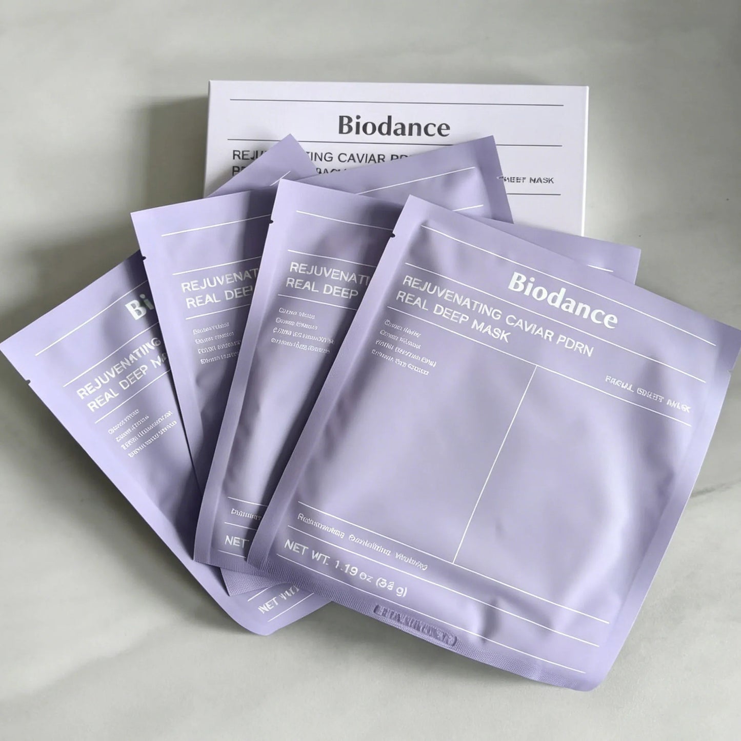 Facial essence mask applied to face for deep hydration, firming, and soothing sensitive skin