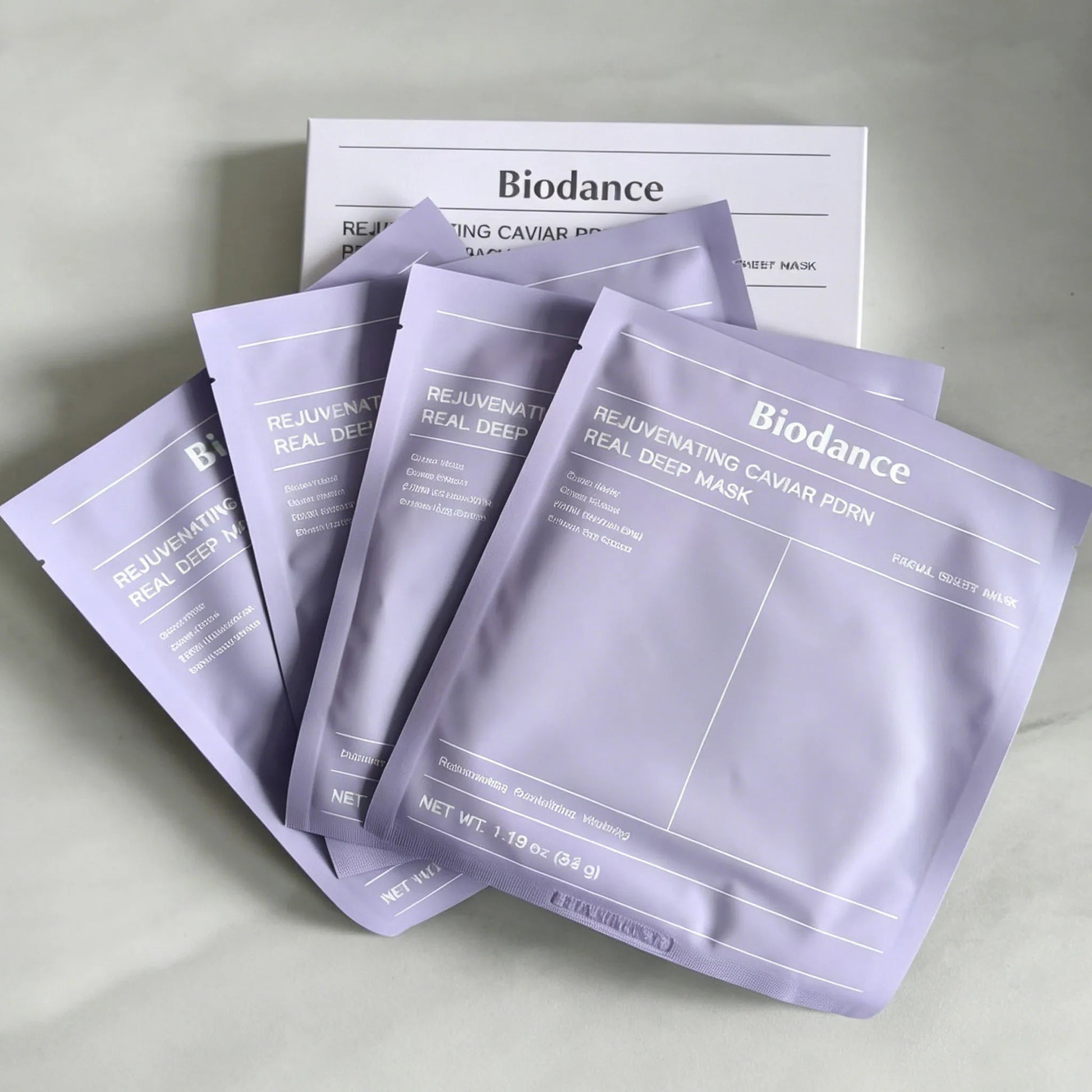 Facial essence mask applied to face for deep hydration, firming, and soothing sensitive skin