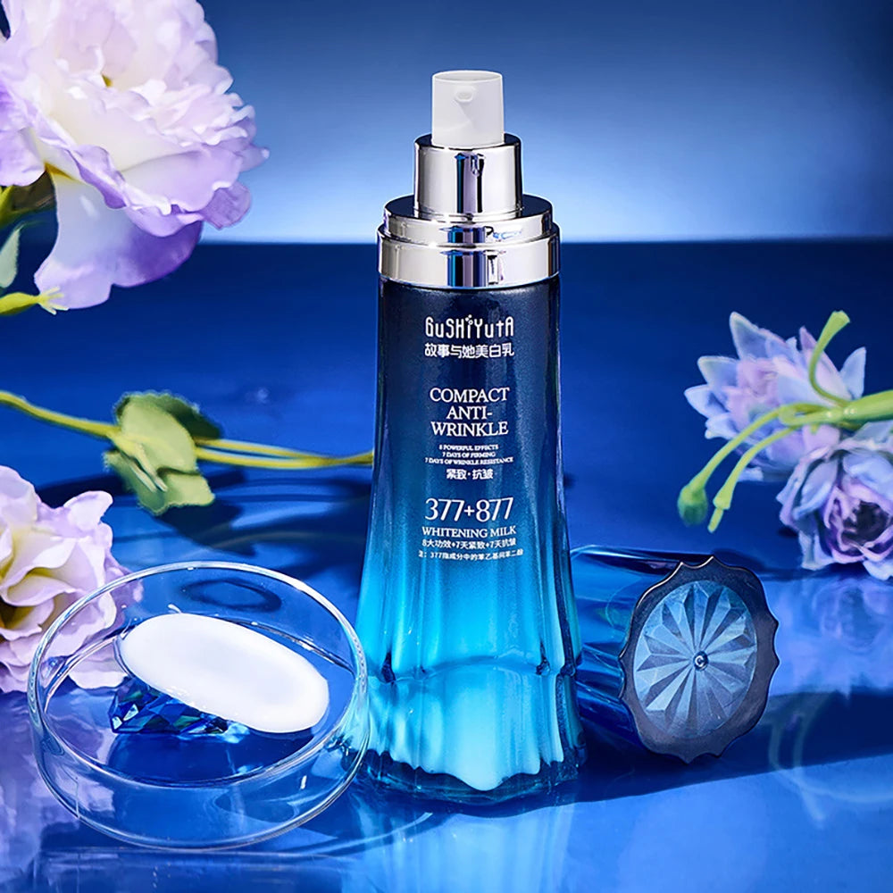 GUSHIYUTA Melanin Repair Brightening Face Lotion — Melanin Repair — Gradient blue pump bottle with petal texture on white background