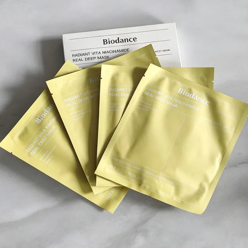 Facial sheet mask applied to face for deep hydration, firming, and soothing sensitive skin