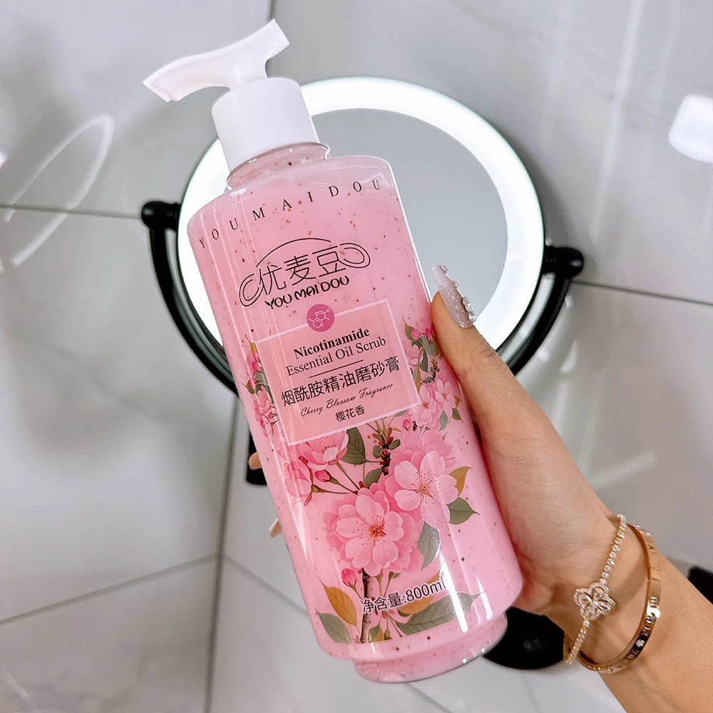 Bottle of mango peach bubble shower gel with foamy bubbles.