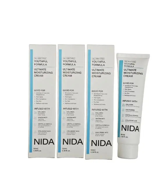 NIDA Natural Plant Extract Face Cream — Natural Plant Extract — White and blue squeeze tubes with boxes on white background