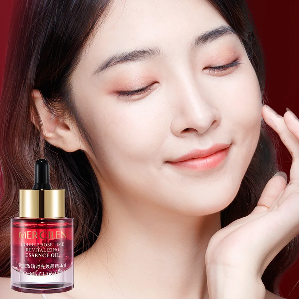 MERCILEN Double Rose Time Revitalizing Essence Oil — rose + essential oils — bottle and box side by side on white background