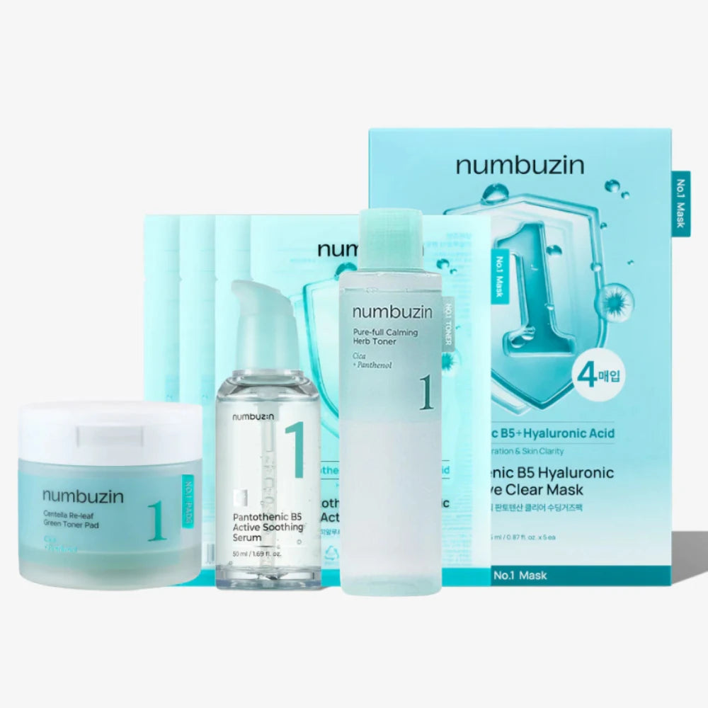 Skincare set with soothing serum, calming toner, hydrating mask, and centella toner pads on display.