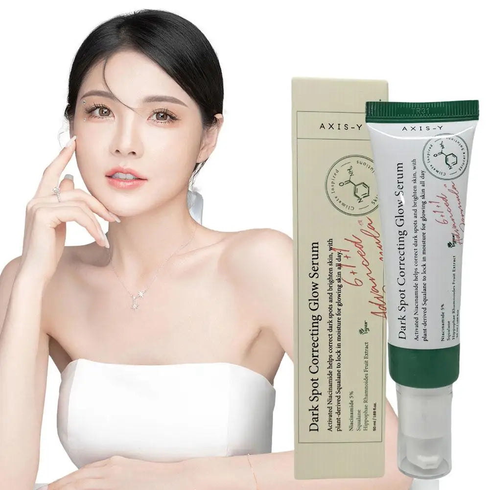 Dark spot correcting glow serum bottle with dropper, skincare product on light background
