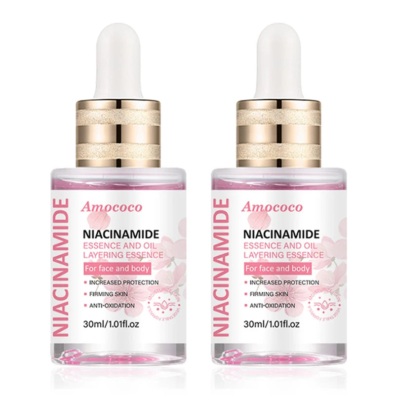 Two 30ml bottles of turmeric niacinamide water-oil layered facial serum with vitamin C and hyaluronic acid.