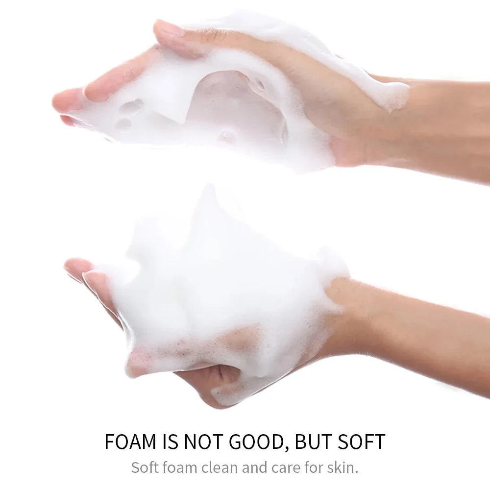 Brightening rice facial cleanser foam bottle with raw pulp extract and creamy lather.