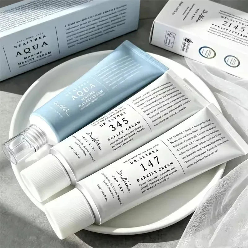 DR ALTHEA 345 Face Moisturizer Daily Soothing Cream And Mist — 345 Relief Formula — Light blue and white squeeze tubes with box on white background