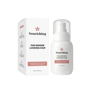 Spray bottle of fermented rice water hair growth treatment with biotin and caffeine for scalp care