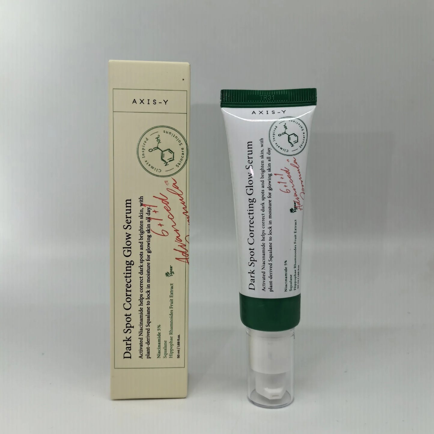 Dark spot glow serum cream bottle