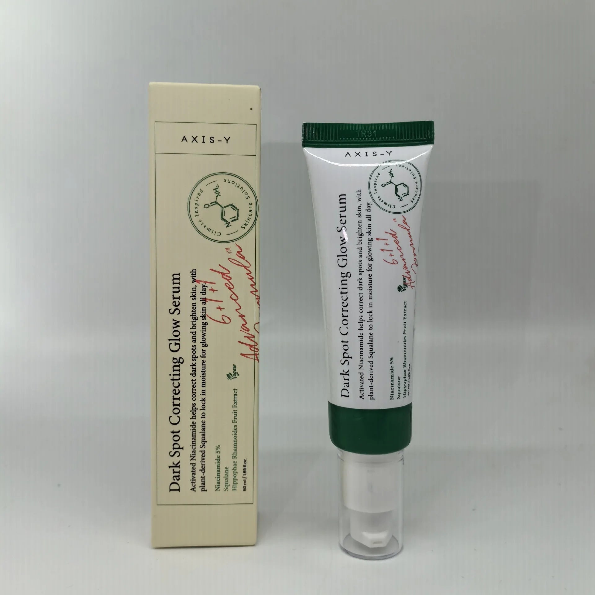 Dark spot glow serum cream bottle