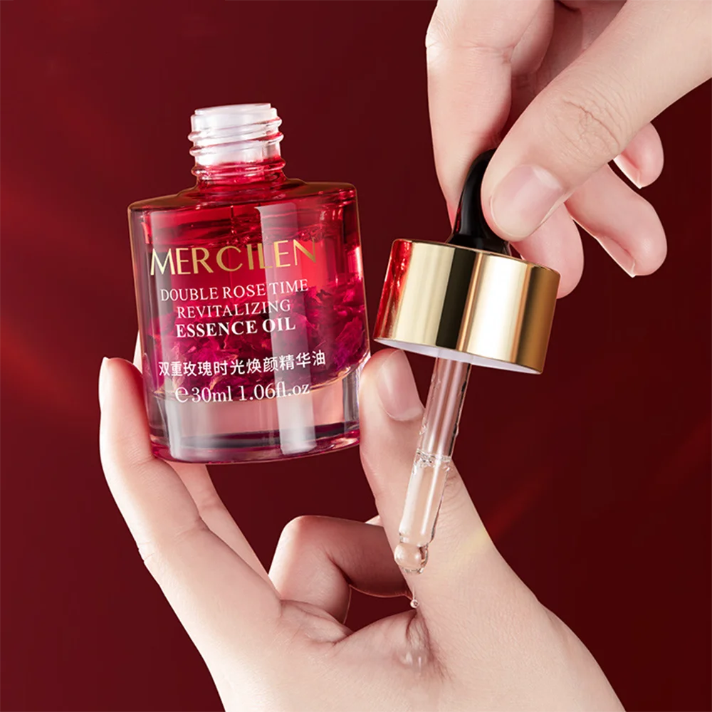 MERCILEN Double Rose Time Revitalizing Essence Oil — rose + essential oils — dropper detail close-up on white background