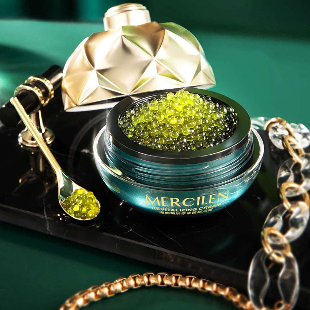 MERCILEN Sea Grape Collagen Firming Face Cream — Sea Grape & Collagen — Teal jar with gold lid and green bead spheres on white background