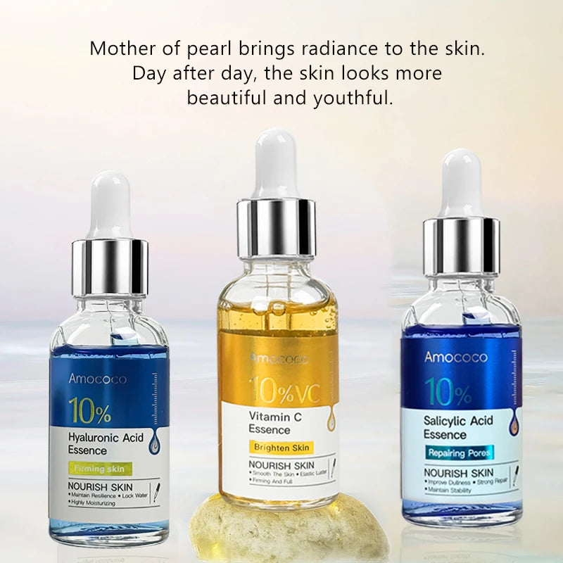 Set of two facial serum bottles with salicylic acid, vitamin C, and hyaluronic acid for hydrating and brightening skin