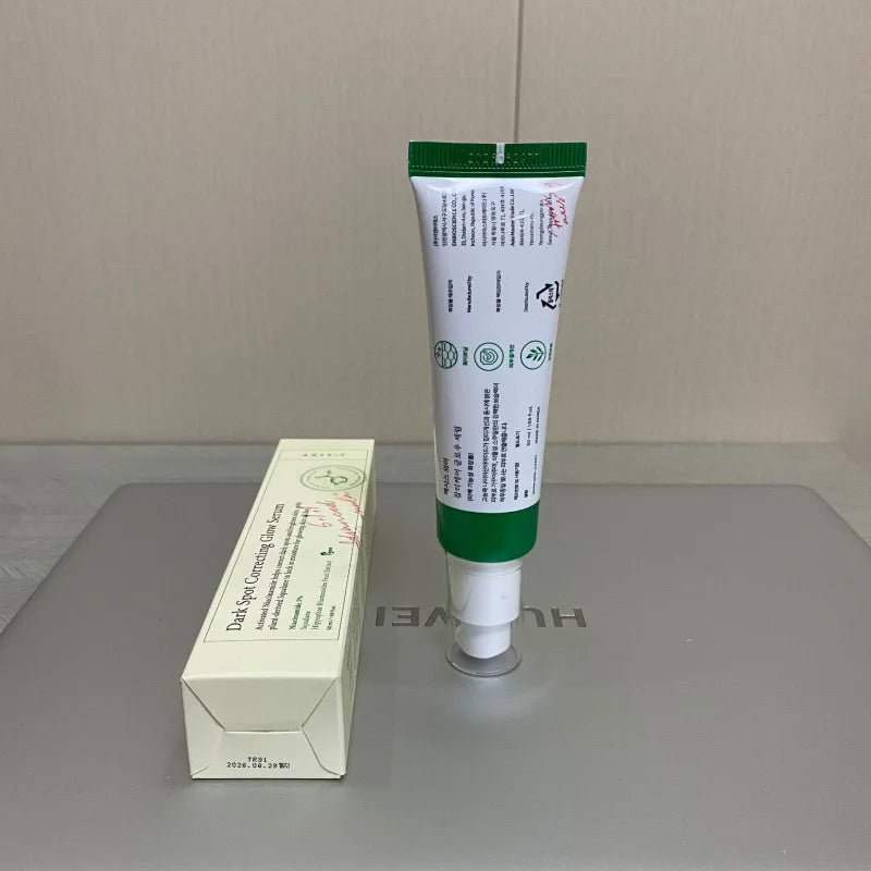 Dark spot correcting glow serum bottle for brightening skincare