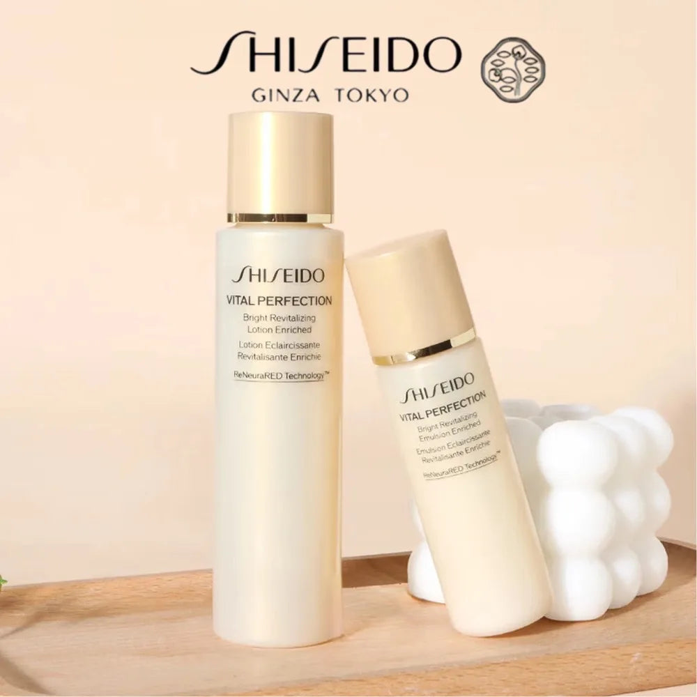 Two travel-size skincare bottles with pump dispensers in a set