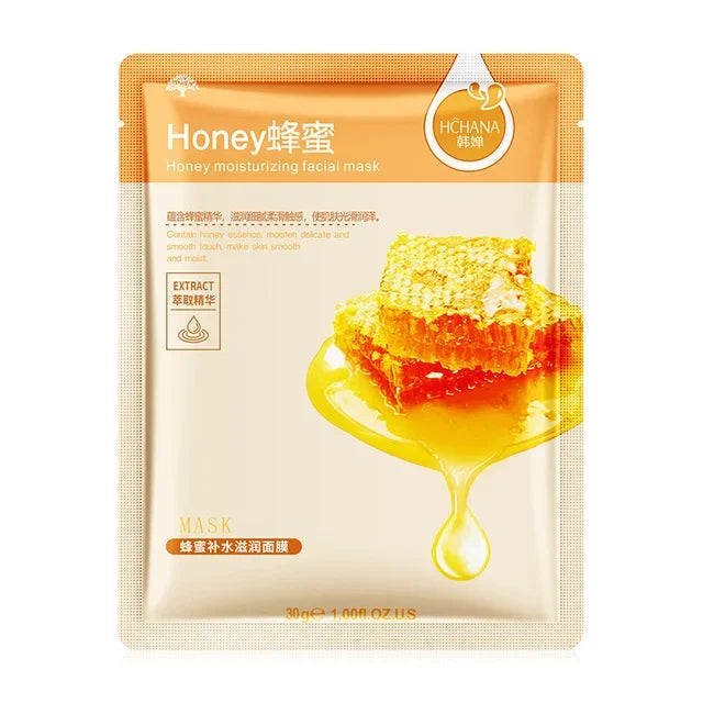 Sheet mask packets displayed with fresh olives, aloe vera leaves, and citrus fruits for natural skin care.