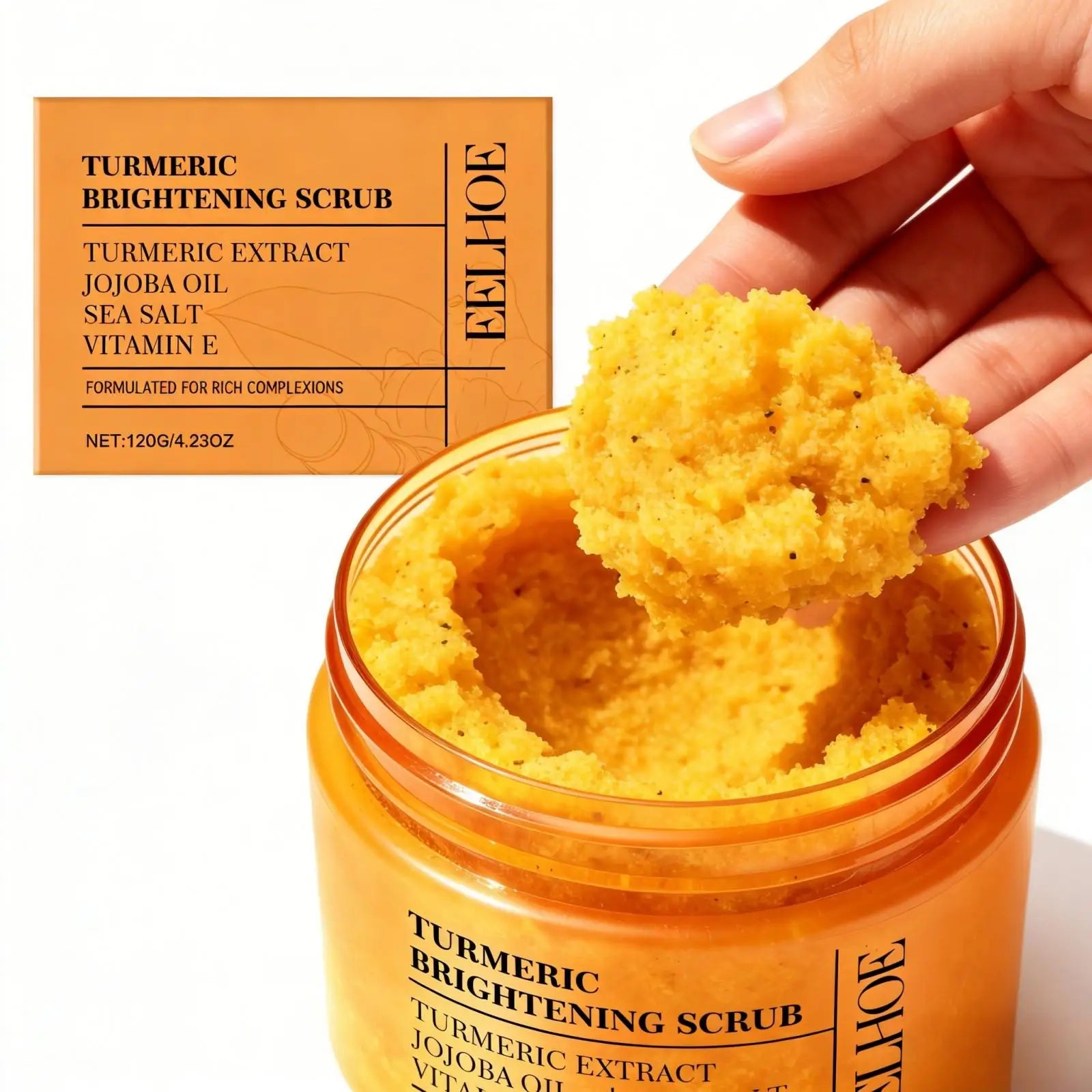 EELHOE Turmeric & Sea Salt Body Scrub — Turmeric & Jojoba Oil — Scrub jar front view with scoop