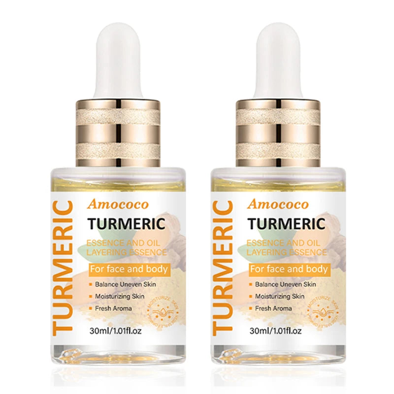 Two 30ml bottles of turmeric niacinamide water-oil layered facial serum with vitamin C and hyaluronic acid.