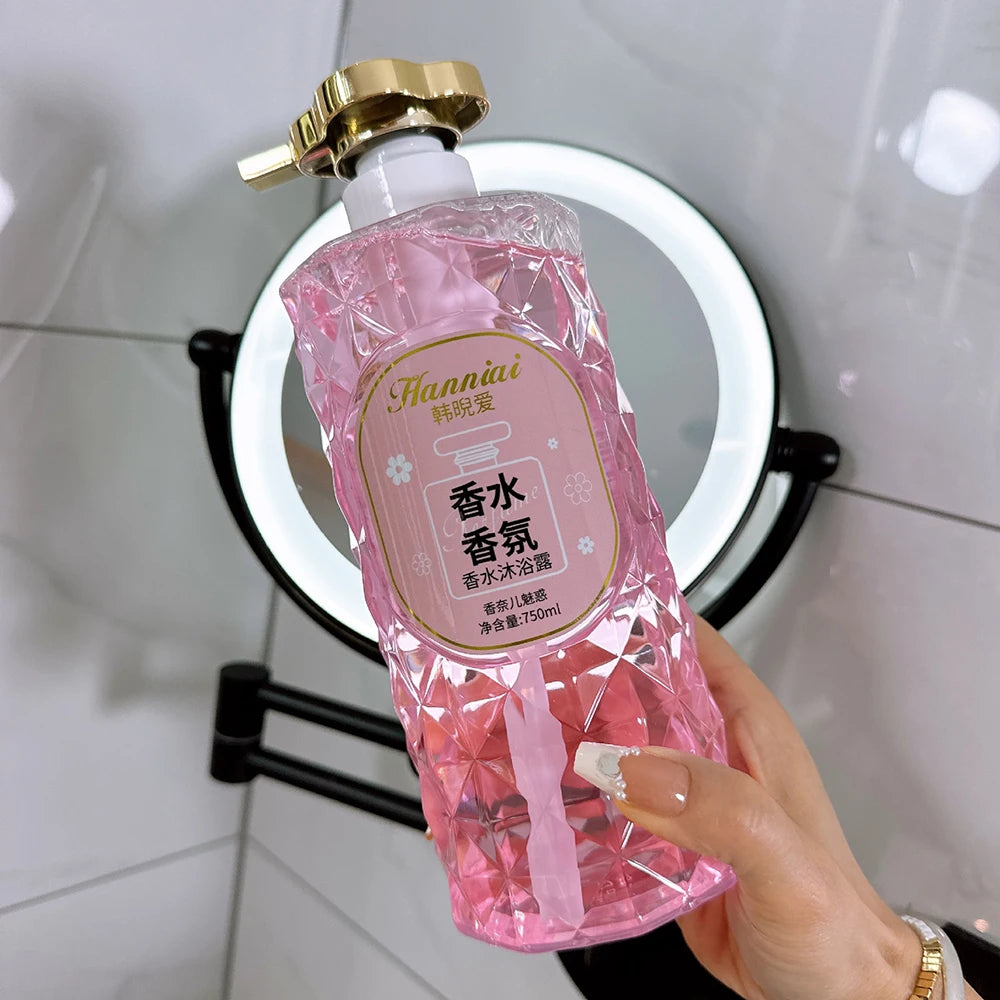 Bottle of mango peach bubble shower gel with foamy bubbles.