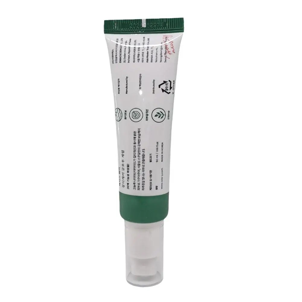 Dark spot correcting glow serum bottle with dropper, skincare product on light background