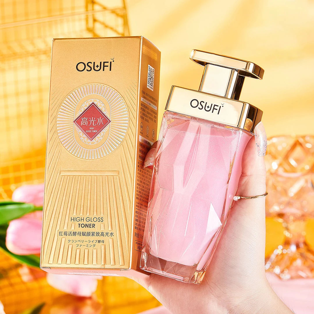 SkinSwaag Beauty — OSUFI Cranberry Yeast Brightening Face Toner — Red and white bottle on white background