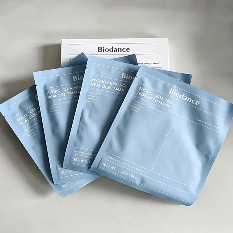 Facial sheet mask applied to face for deep hydration, firming, and soothing sensitive skin