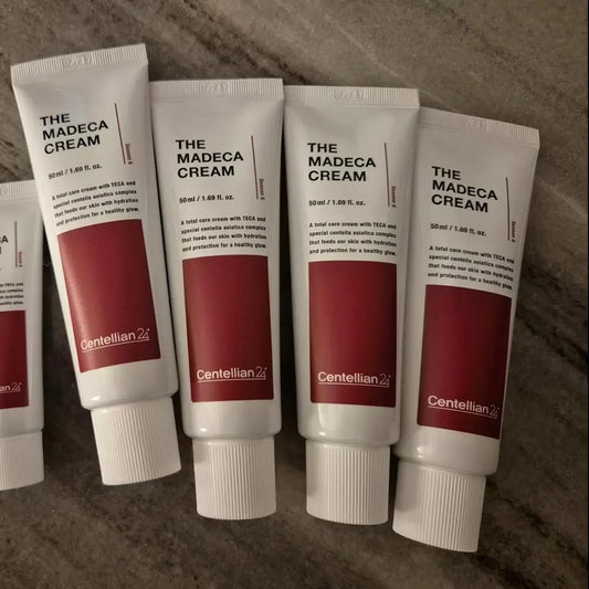Centellian 24 The Madeca Cream Active Whitening Moisturizer — Madeca & Centella — White and dark red squeeze tube on white background