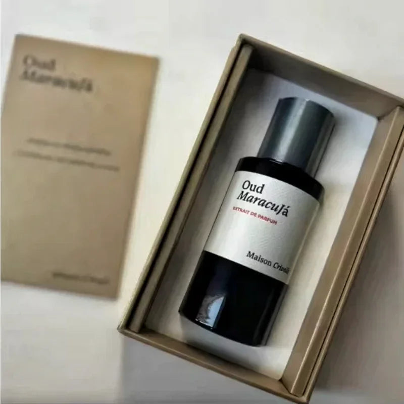 SkinSwaag Beauty Oud Maracuja Floral Unisex Eau de Parfum — oud + maracuja + floral — bottle and box side by side on white background