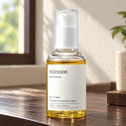 mixsoon Bean Essence, one 50 ml pump bottle with its overcap on a dark wood vanity.