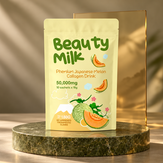 Beauty Milk melon-flavor single pouch on olive stone with amber glass; styled product photograph.