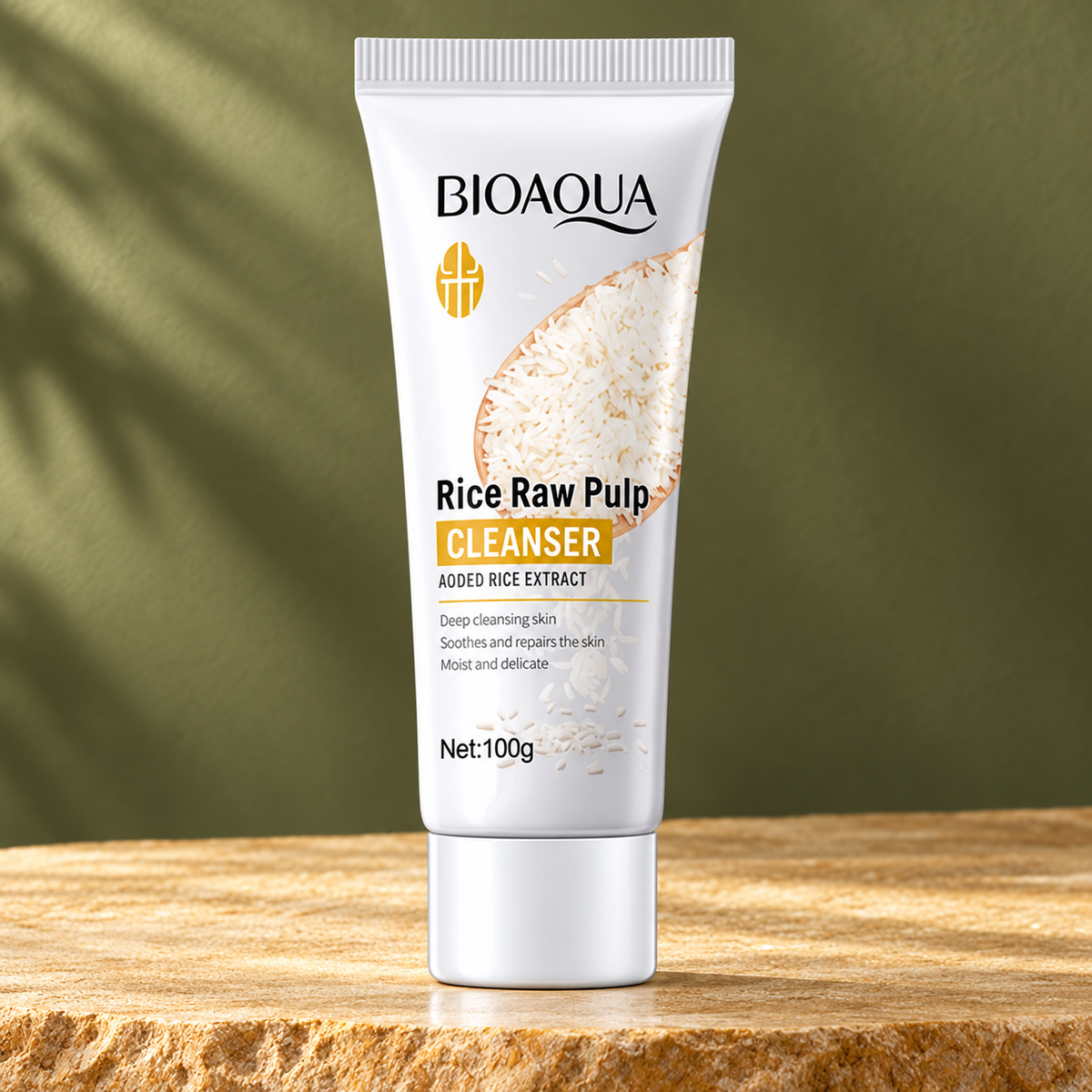BIOAQUA Rice Raw Pulp Cleanser — 100 g on colored stone studio background