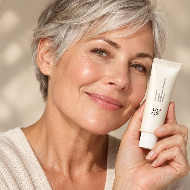 Beauty of Joseon Relief Sun: Rice + Niacinamide — 50 ml — model holding product