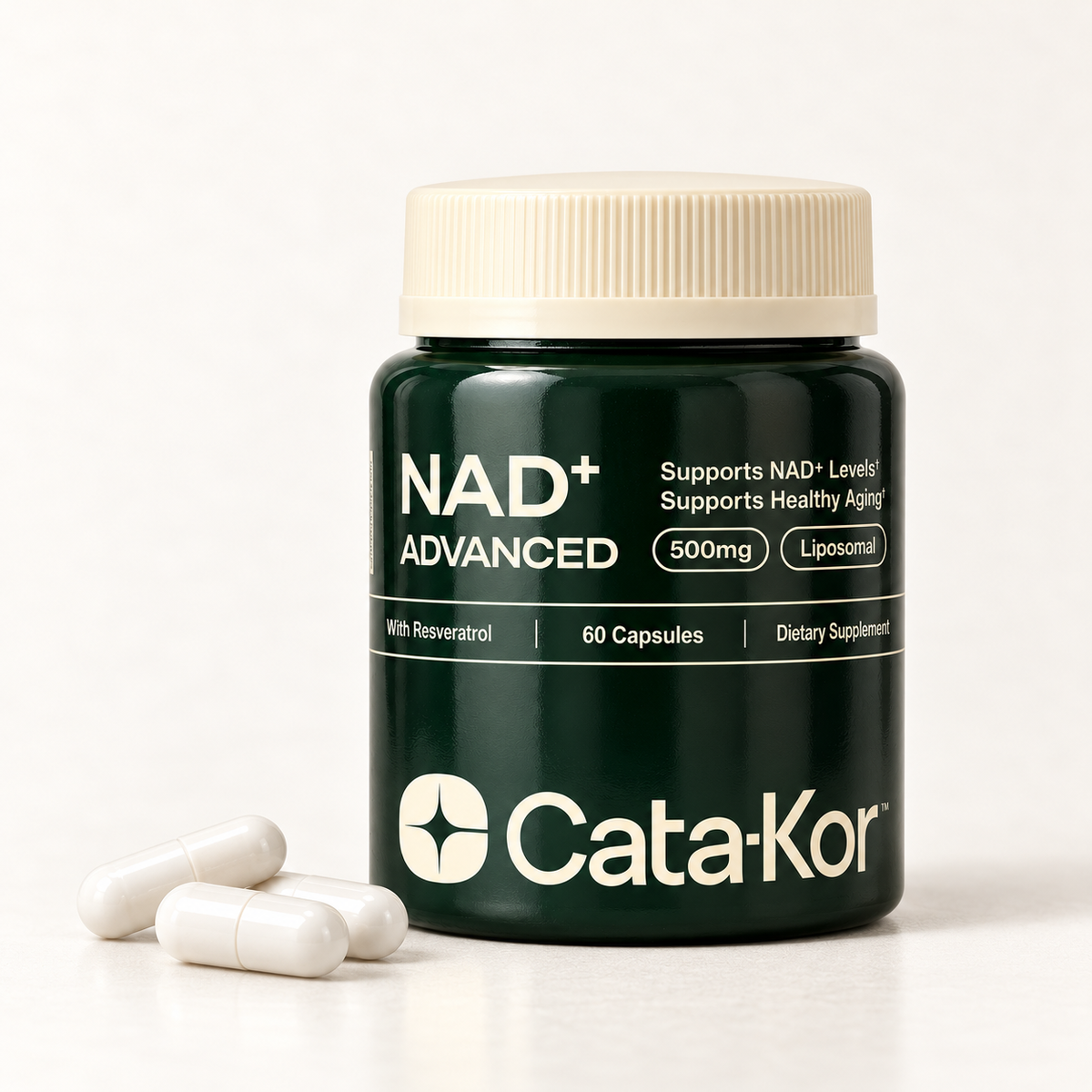 Cata-Kor NAD+ Advanced cream-cap bottle beside white capsules on a clean studio background