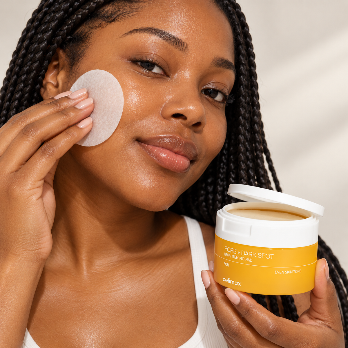 Celimax Pore + Dark Spot Brightening Pad — model demonstrating use