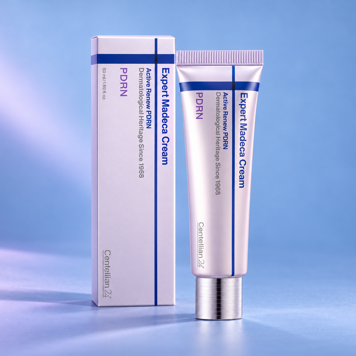 Centellian24 Expert Madeca Cream Active Renew PDRN 50 ml tube and matching carton on a sky-blue backdrop.