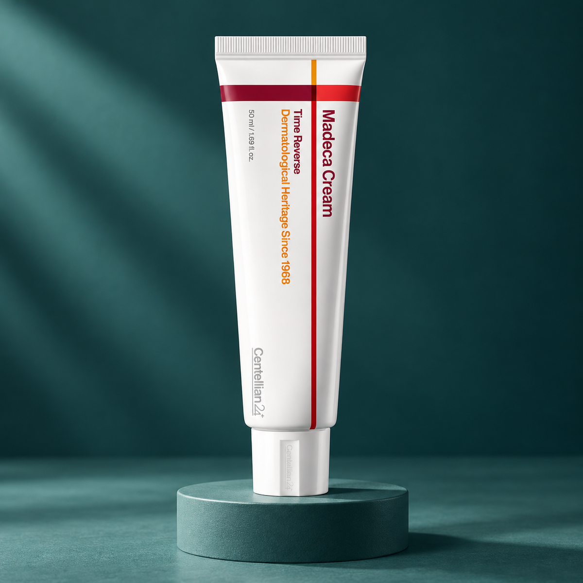 Centellian24 Madeca Cream Time Reverse 50 ml tube on a deep teal pedestal
