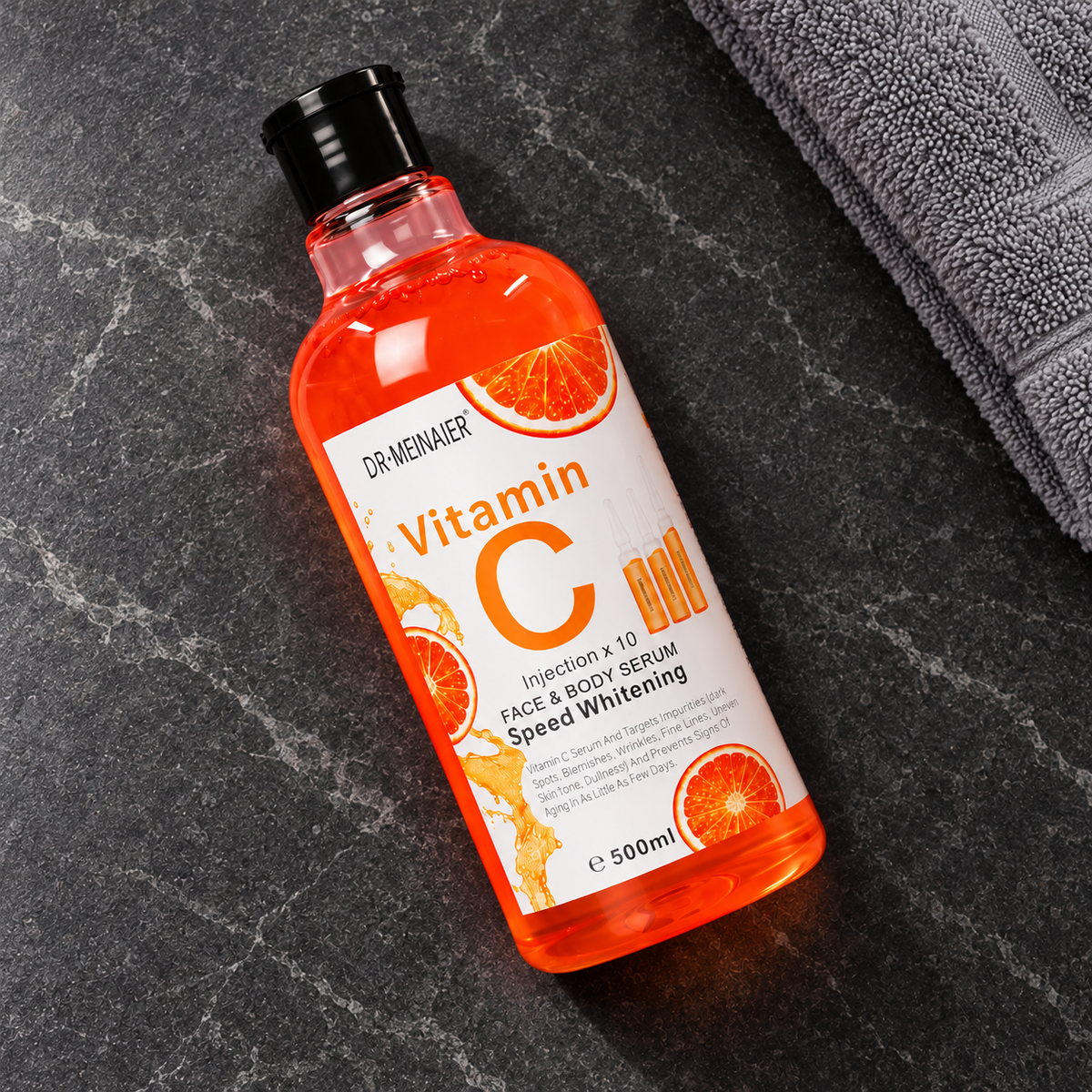 Dr. MEINAIER Vitamin C Face & Body Serum — 500 ml — closed 500 ml bottle in a diagonal flat lay