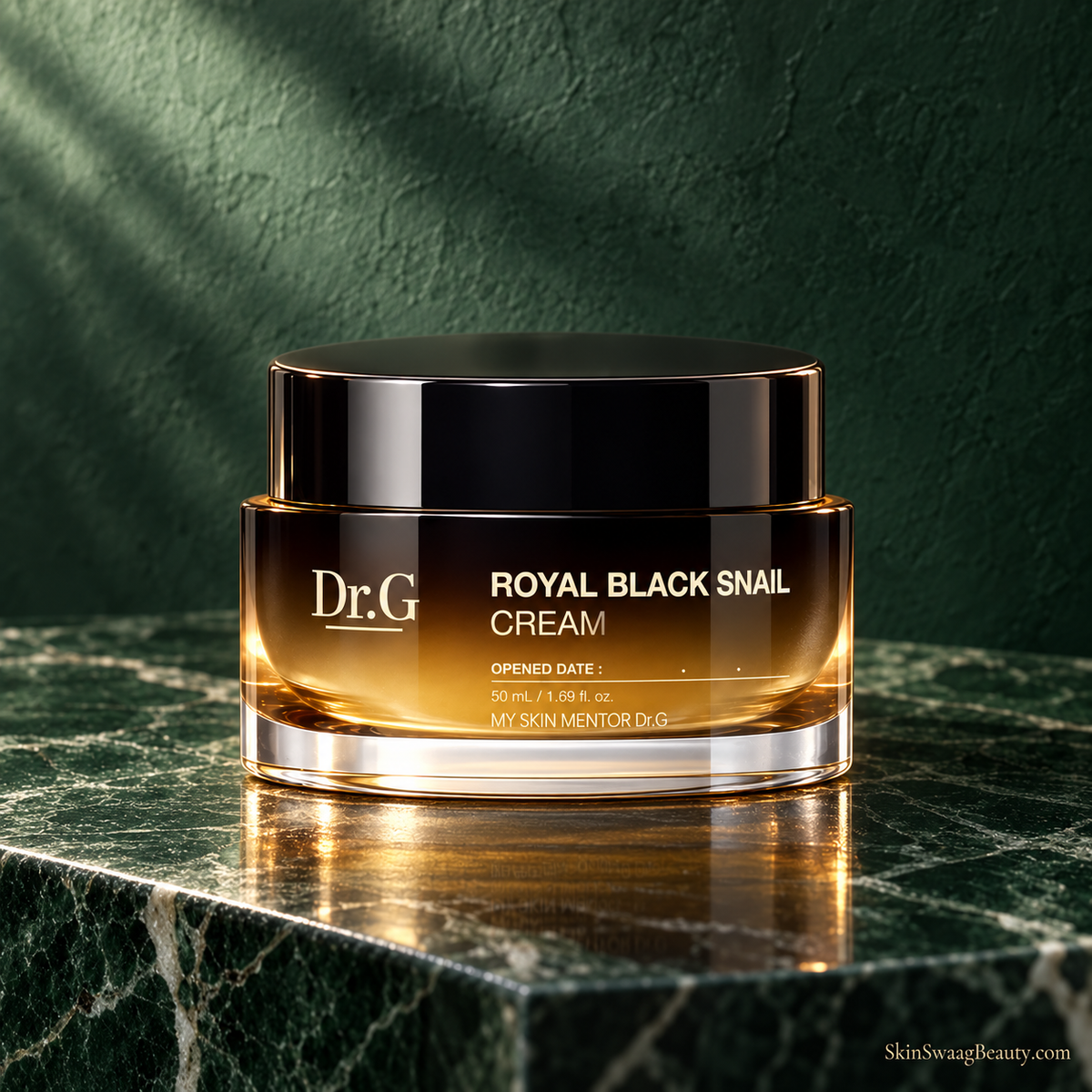 Dr.G Royal Black Snail Cream 50 ml, closed amber-and-black jar, emerald detail styled product-only view; props not included.