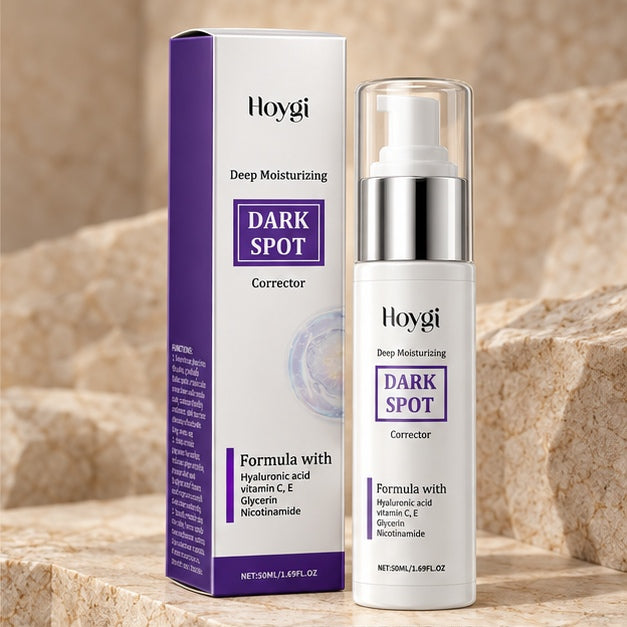 HOYGI Dark Spot Corrector 50 ml bottle and carton on a stone surface