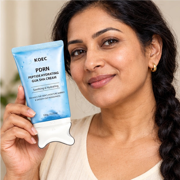 KOEC PDRN Peptide Hydrating Gua Sha Cream — 120 g — model holding product
