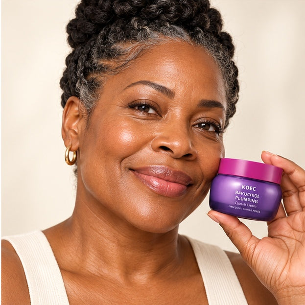 KOEC Bakuchiol Plumping Capsule Cream — model holding product
