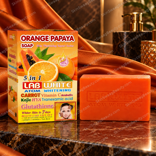 LAB WHITE Orange Papaya soap bar and carton on copper satin; SkinSwaagBeauty.com watermark.