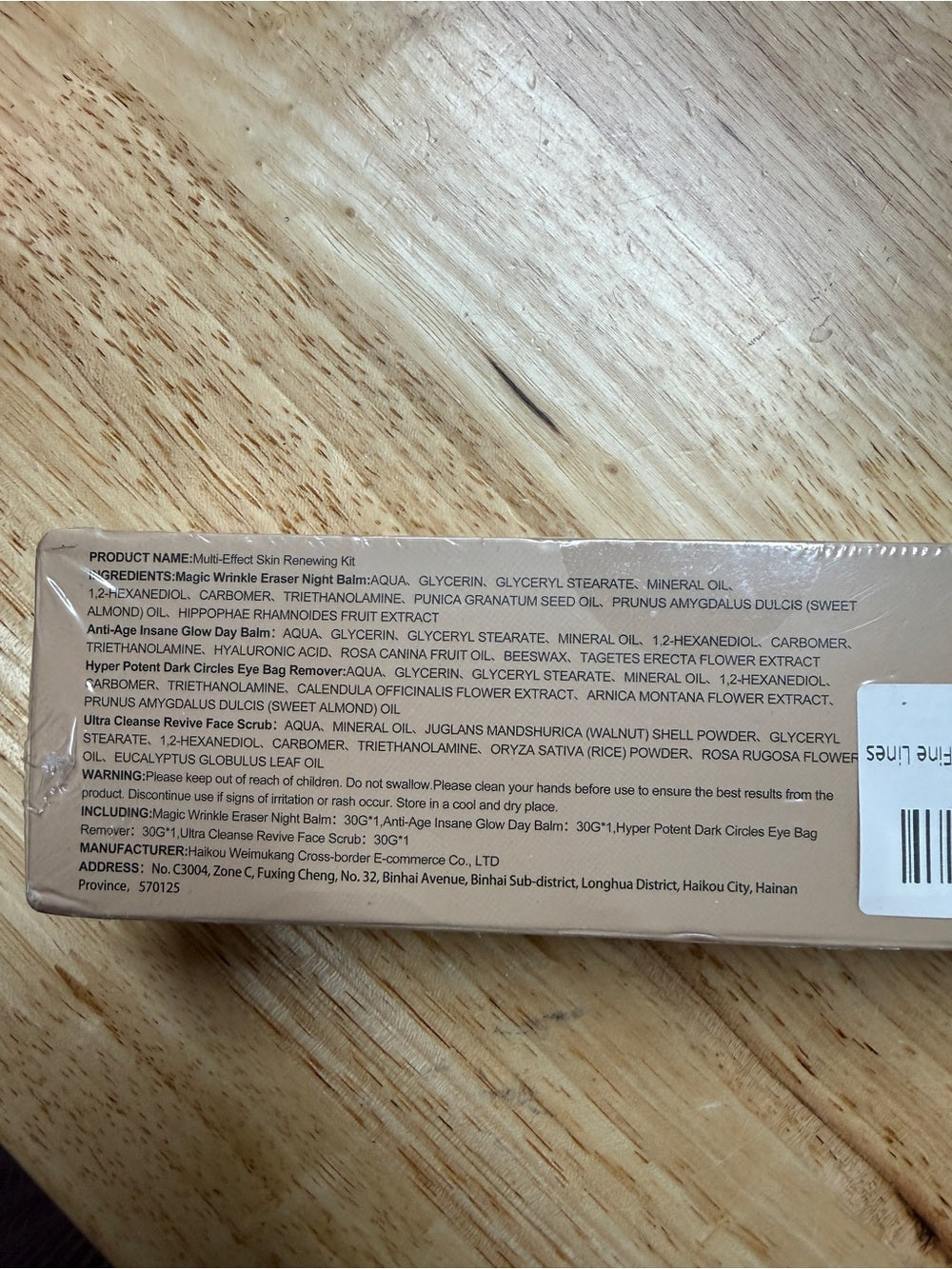 Physical carton-back reference photograph showing printed ingredients, cautions, manufacturer and four 30 g contents.