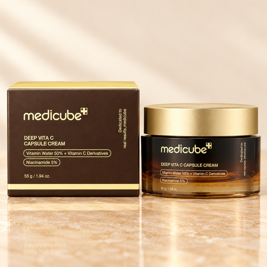 Medicube Deep Vita C Capsule Cream 55 g, closed original gold-lidded jar beside its original retail carton