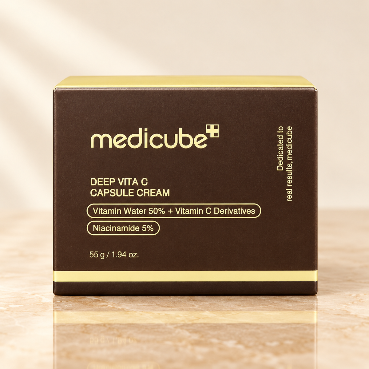 Medicube Deep Vita C Capsule Cream 55 g carton in a luxury studio setting