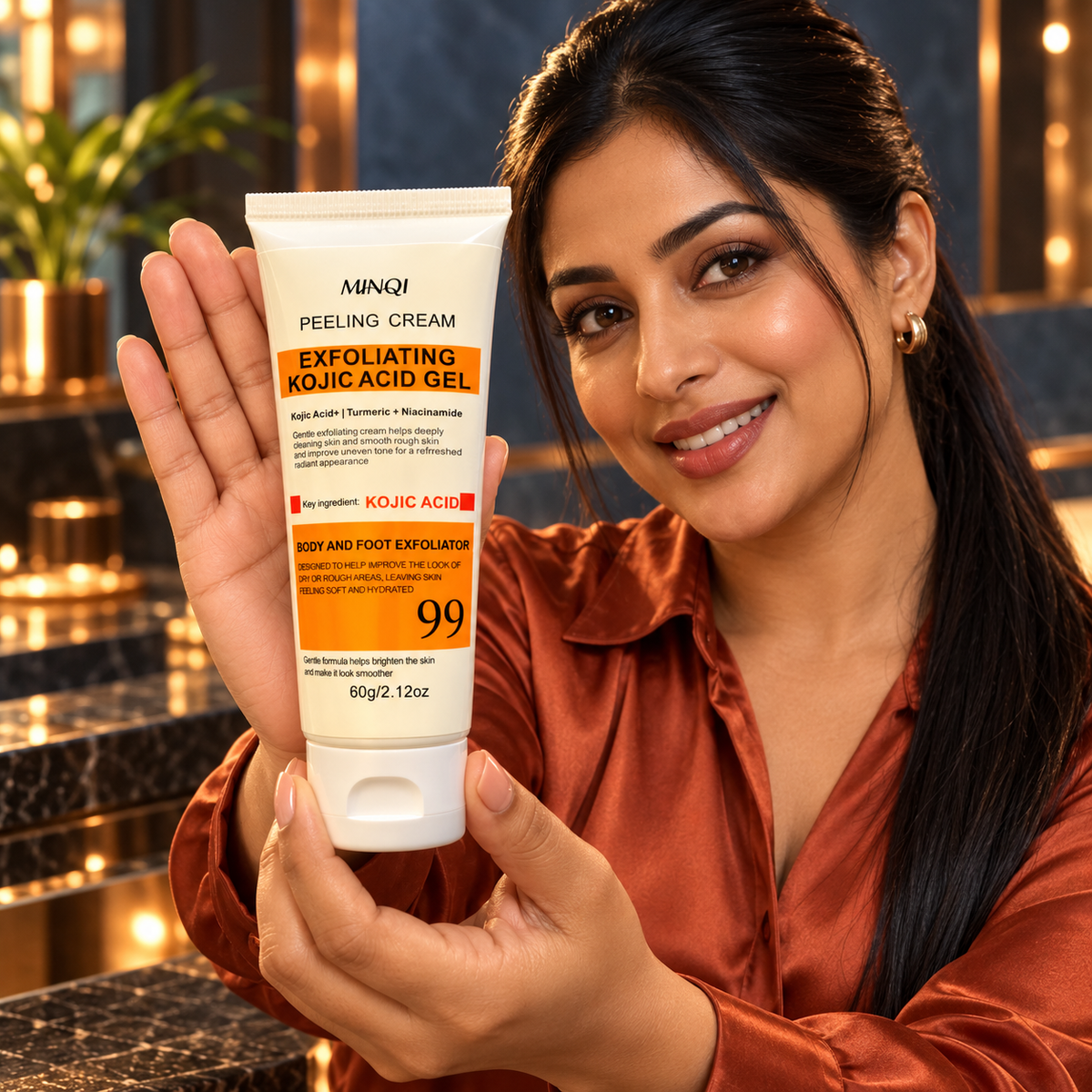 Woman actively presenting the MINQI Exfoliating Kojic Acid Gel 60 g unboxed closed tube in a richly colored setting